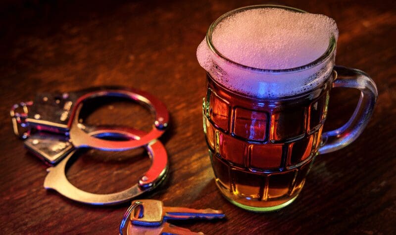 Handcuffs and a beer